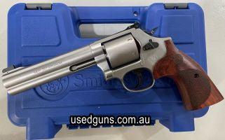 Brand new in the box. Smith and Wesson M686 International 357 magnum revolver. 6" Barrel, unfluted cylinder and timber grips. S&W Model number 10125. Comes case