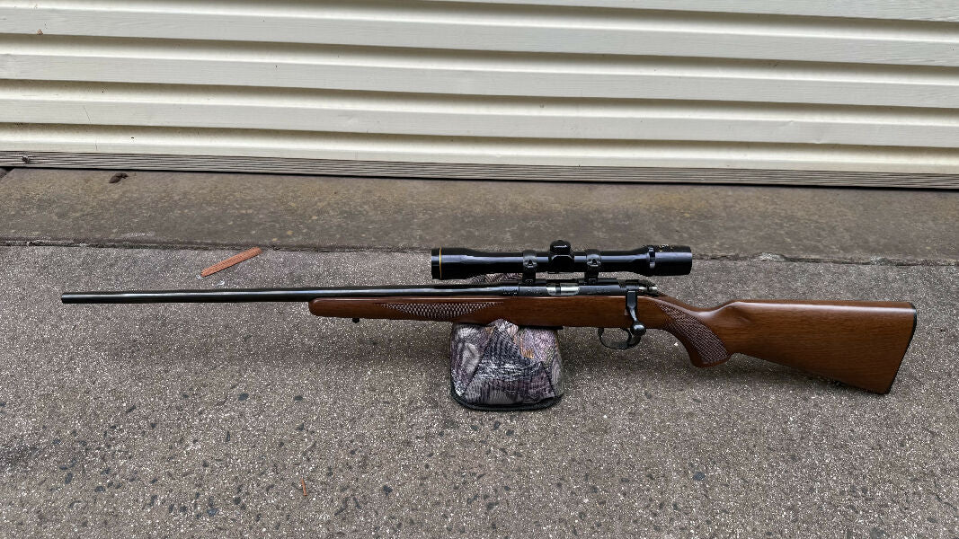 Left handed CZ 452 American in 22LR excellent condition rifle, manufactured with CZ America, Kansas City. Comes with a Nikko stirling 4 x 32 scope and all spare