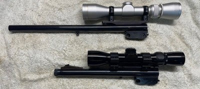Two Scoped Thompson Contender barrels 14 inch 223 Rem Super 16 with Leupold Vari X 2.5-8x32 Extended eye relief. 10 innches 22LR Match barrel with Bushnell High