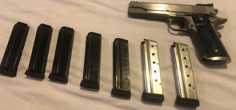 Colt Gold Cup trophy 9mm Comes with holster belt and mag holders. has 2x original colt stainless magazines and also 5x 10 shot steel mags. Colt is in very good 