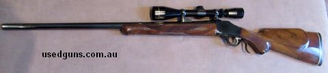 Heavy barrel model with a small scratch near the muzzle. Brilliant action.