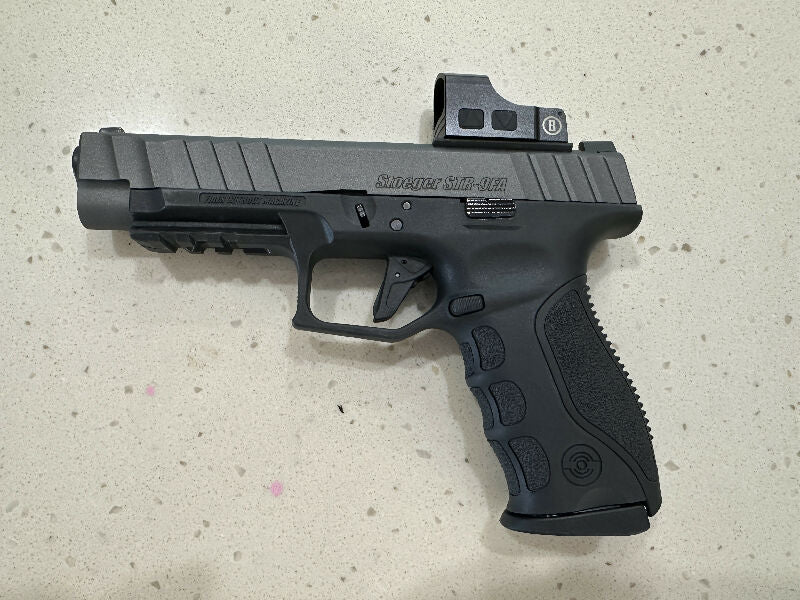 For sale: Stoger STR-9FA semi-automatic pistol chambered in 9mm with a Bushnell red dot.