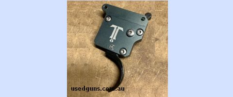 Triggertech special 2 stage trigger . Curved shoe. No bolt release. Suits Rem 700 clone actions. Was used briefly on a Kelbly Atlas .