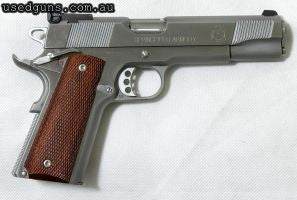 A stunning pistol in very good condition with satin stainless finish and timber grips, this Springfield also has adjustable sights. All steel construction. Spar