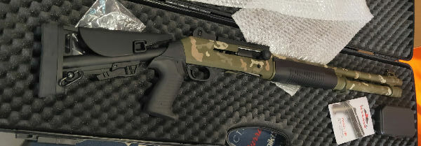 Sulan Tac-12X in better than new condition. In carry case with full set of chokes including slug choke. Ceracoated in camo .Been modified to 5 shot mag as per r