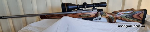 Tikka T3 in highly underrated 25-06. Has upgraded bolt handle and shroud. Fitted with muzzle brake and a Richards laminated stock. VXL riflescope has the Boone 