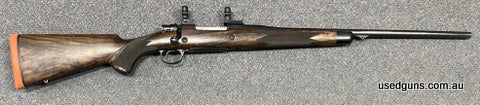 Custom FN 98 in 338 Win Mag. Stunning exhibition grade stock with ebony fore-end. 24" Barrel with sling swivel. comes with 1" Leupold rings. $65 Freight to your
