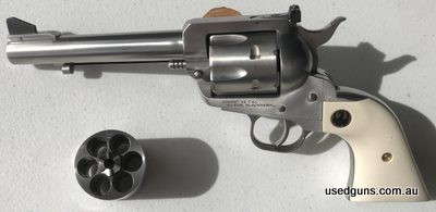 Stainless Ruger Blackhawk with two cylinders. 45 ACP and 45 Long Colt. 140mm barrel only fired light loads for western action. Please use text or email as I am 