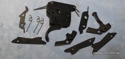 Remington 700 trigger parts. Ideal base for 3 leaver conversion. Price includes express post including tracking