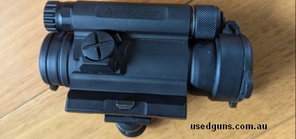 Military Spec Aimpoint CompM4 red dot sight. Fully waterproof and 80,000 hrs of battery life.