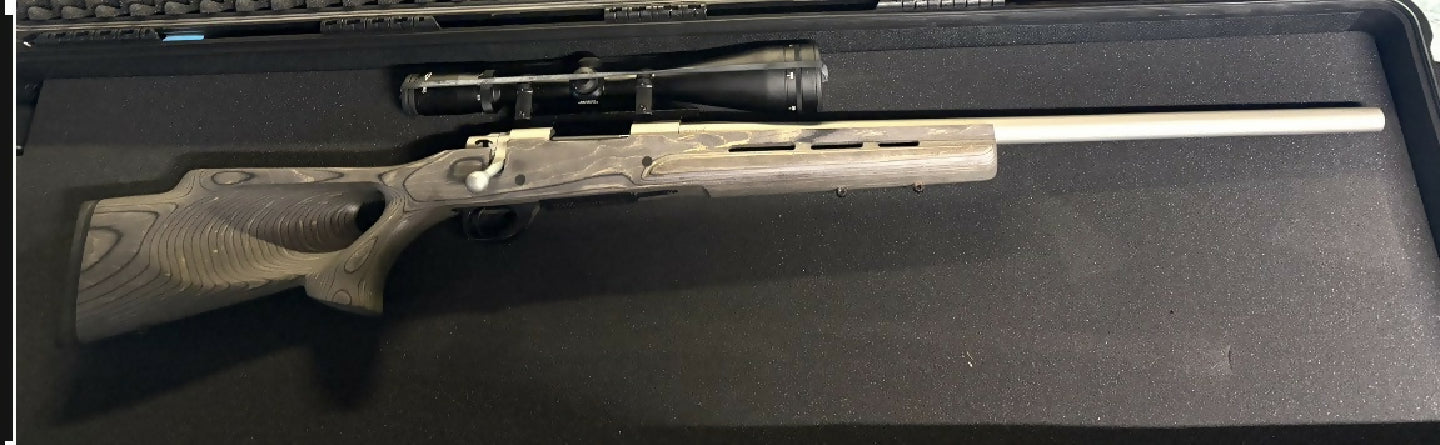 243 Howa, cerakoted varmint barrel, cerakoted bolt. Boyds pepper thumb hole stock. Fired 22 rounds. Shoots sub 1 MOA with ease.