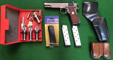 STOCK NUMBER 536 ‚Äö√Ñ√∂‚àö√ë‚àö¬® PLEASE QUOTE THIS NUMBER WHEN ENQUIRING. COLT WOODEN GRIPS, 3 MAGS, BIANCHI 100A HOLSTER, MERNICKLE DOUBLE MAG HOLDER, LYMAN 