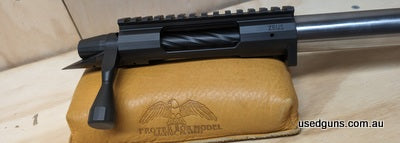 This is a right hand short action terminus Zeus with 308 bolt face The action is basically new... In unmarked excellent condition It's currently mated to a 8 tw