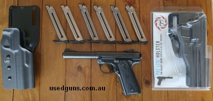Ruger MkIV 22/45 in very good condition, volquartsen trigger kit, match sear, firing pin, extractor and springs. 7 brand new magazines, volquartsen mamba holste