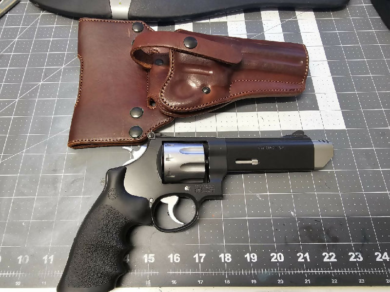 Smith And Wesson 627 V-Comp 357 8 shot N frame with a bunch of moon clips