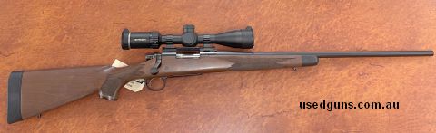 New Remington 700 CDL 7MM-08. Timber stock and blued action/Barrel. Fitted with Riton 4-16x44 scope