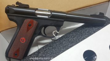 This is a Ruger 22/45 Mark 3 Rimfire pistol with wood handgrips and a 10 shot magazine. Barrel length is 140mm. I have only used it 7 times at the local gun clu