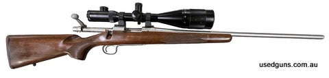Good to very good Remington 700 Sporter Stainless in 220 Swift. Comes with a Nightforce 8-32x56 scope. Marks on stock shown in photos.
