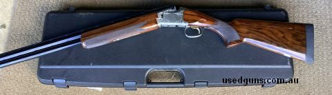 Very nice timber , adjustable stock , spare firing pins and cased.