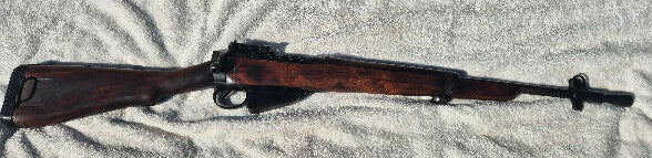 No 5 Lee Enfield Jungle carbine .303 Brittish. Selling out of collection. Matching numbers and original. Very good + condition. Bluing very good. Stock is in gr