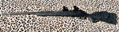 As new Weatherby Mark V Accumark in 270W. Trigger adjusted to 1lb. , Leupold bases and 1‚Äö√Ñ√∂‚àö√ë‚àöœÄ PRW rings. Black stock with grey spider web. Fired 10 