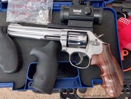 S&W 22LR 617 in excellent condition and very accurate pistol, it comes with 3 x grips, Bushnell 1x40RD with original rear iron sights original paperwork and tes