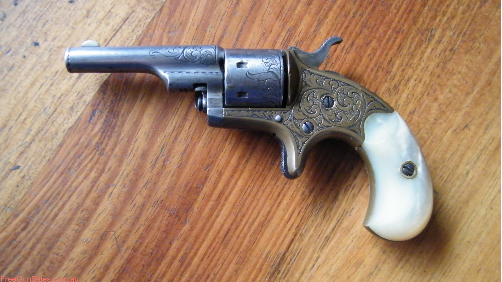 Colt Open Top1874 22RF Engraved