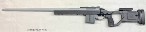 Custom Tikka, H-S Precision heavy varmint barrel, threaded to 5/8X24. Cerakoted in battleship grey, bolt micro slicked. CTR bolt knob and early KRG X-Ray chassi