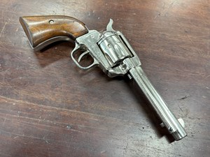 COLT
FRONTIER SCOUT
22LR
6 SHOT
SINGLE ACTION
4.75 INCH BARREL
NICKEL FINISH
ORIGINAL TIMBER GRIPS
CLEAR COLT HARTFORD ADDRESS ON BARREL
MANUFACTURED 1963
#18456K 

GC+ $590
