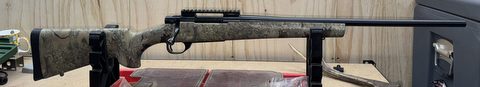 Howa 1500 with Houge soft touch camo stock. Great shooter. Comes with rail and 10 shot magazine conversion as well.