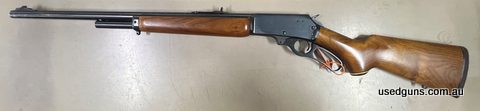 Old school Marlin 1895 lever repeater in walnut and a blued barrel. In good condition. Slight rust on the lever and the action. Has been cleaned off lightly. So