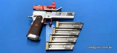 Safari Firearms Handgun Sale! Excellent condition STi 2011 Relic Custom in 38 Super. Kitted out racegun. C-More red, red dot sight. Comes with 5 magazines total