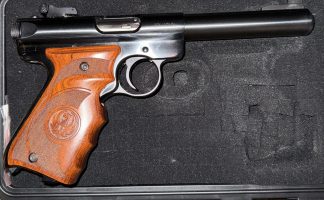Ruger Mark 3 in very good condition. Includes hard case, cleaning kit, trigger lock, two magazines and soft field bag. Comfortable competition hand grip. The pi