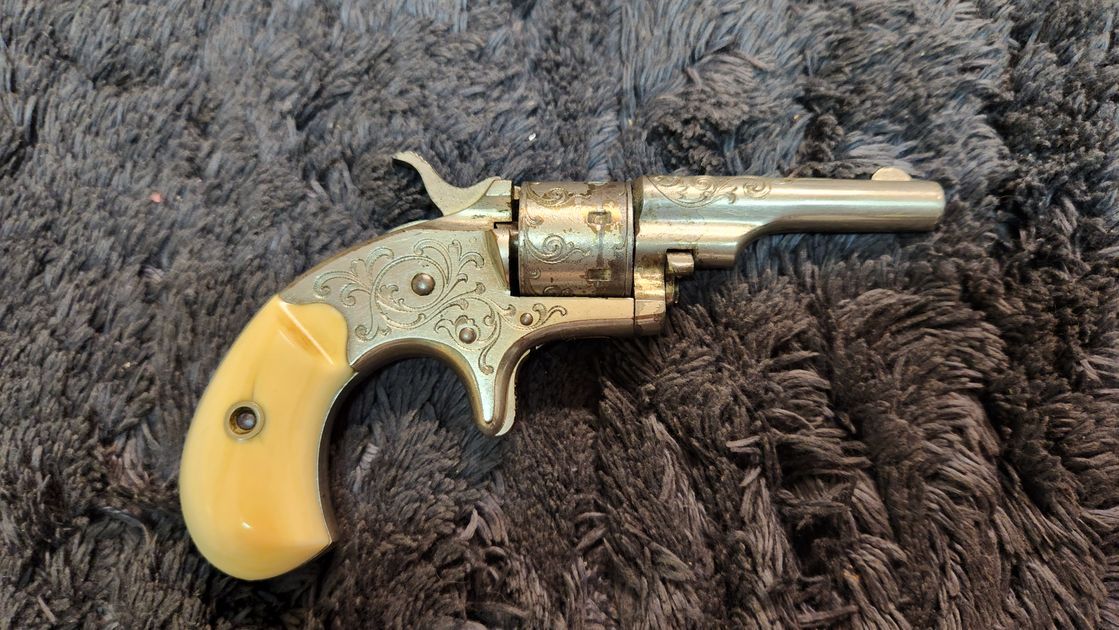 Colt Open top with Ivory grips
