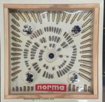 Swedish Norma Factory Cartridge & Bullet Head Display Board This is a Norma Factory display board with brass rifle cartridges from .22 Hornet up to .375 H & H a