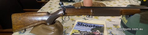 Marked Zbrojvka Brno Narodni podnick. Extremely hard to find in deluxe form. Full length target barrel - slight fake fade to blueing. Has checkered factory stee