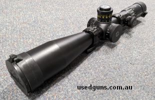 A Schmidt & Bender PMII 5-25x56 in very good condition. This scope has the DT elevation turret and the GR2ID reticle. Comes with Spuhr hunting rings with Sako b