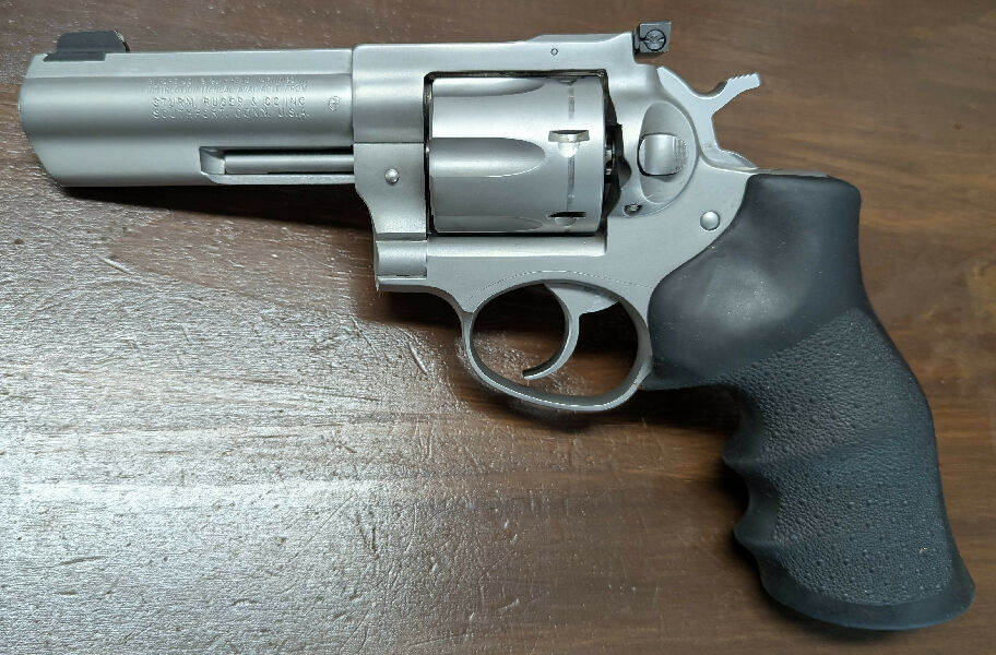 Fantastic Revolver. Slight wear marks on high points and cylinder. Matte finish. Super-light action (Wolff springs). Adjustable Meprolight tritium rear sight (