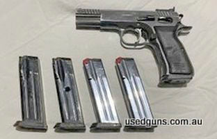 Stock standard gun, honest shooter, wear marks, 5 mags. Selling to fund new project