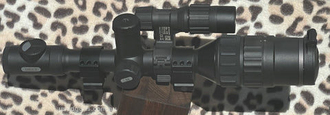 Pulsar C50 Day & Night digital scope. Works very well , comes with all accessories in original soft case. Included is eye cup , rechargeable batteries , IR illu