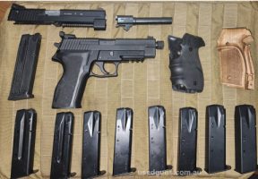 Sig Sauer P226 Tac Ops model 9mm Comes with 22lr slide and 22lr 10 shot Mag 8x 10 shot 9mm magazines Spare 9mm barrel 2x additional grips 2x factory hard cases 