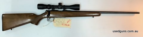 Good solid 452 American. Clear scope. High quality rifle. Light rust on barrel, trigger guard, bolt and metal surfaces. No significant pitting. Minor marks on s
