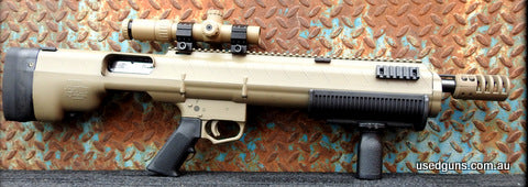 Custom build, very cool set up Mossberg 500. BullPup Unlimited chassis. Chassis Systems Tac-30 scope. Big muzzle break. Slick action. Very unique shotgun Overal