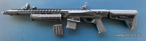 Remington 7615 pump action 223. Full 'Lucky 13' optioned. Flash hider, full length Picatinny rail, Magpul backup sights (BUS). Magpul adjustable stock and pisto