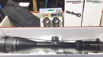 New in box, never used or mounted on rifle, Vortex Crossfire II 6 - 18 x 44 AO Dead Hold BDC rifle scope, comes with new Artic Fox rings 25mm, in blister pack. 