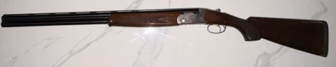 Beretta under & over no use for this firearm any more. Great gun shoots straight $700.00 ONO