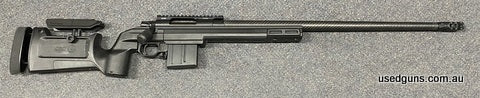 Howa 1500 in 6.5 Creedmoor. Nestled in a KRG Bravo adjustable chassis. MDT enlarged bolt knob. Sports a 26 inch carbon barrel with a muzzle brake installed. 10 