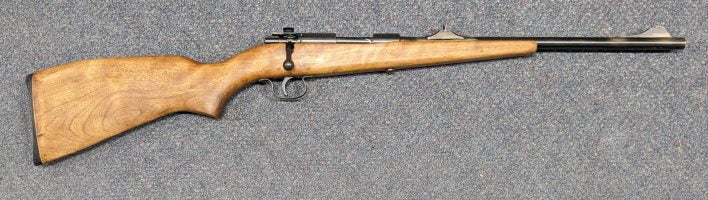 A Winchester Model 121 single-shot bolt-action in 22LR in fair condition. The barrel has been shortened to 16.5" and non original open sights added. Bluing miss