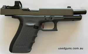 Glock gen 4 model 41 MOS Competition with Overwatch Precision trigger. Tungsten cerakoted slide. MOS slide with red dot and suppressor height sights for co witn