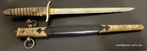 WW2 Imperial Japanese naval dirk in good condition with cherry blossom decorations throughout, ray skin handle grip with wire wrap in great condition, all fitti
